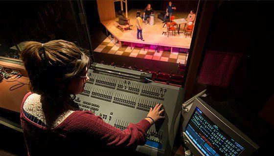 Student working in the control room at Scott Studio Theatre